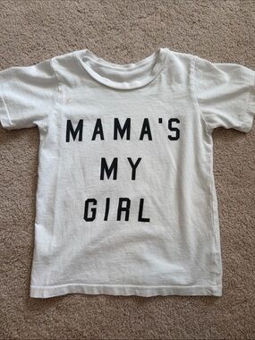White Short-Sleeve Kids Tee with Black "MAMA'S MY GIRL" Graphic